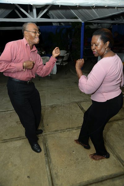 Rudolph Brown/Photographer
Johanthan Brown, president of Jamaica Cooperative Credit Union League dancing with Claudette Christie, at the Jamaica Co-operative Credit Union League 70’s Soiree Chrishmas party at the Boone Hall Oasis, Stony Hill. on Saturday December 8, 2012