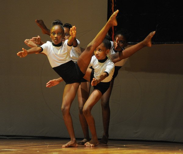 Jermaine Barnaby/Photographer
St Georges Primary School performing "we fierce four" as quartet in class 2- 9 years and under in the FESTIVAL OF THE PERFORMING ARTS – DANCE FESTIVAL
at the The Little Theatre: 4 Tom Redcam Avenue on Tuesday, June 10, 2014.