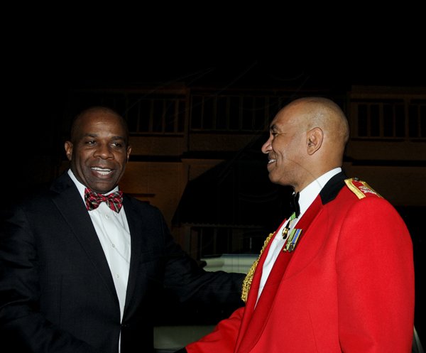 Winston Sill / Freelance Photographer
Major General Antony Anderson, Chief of Defence Staff host Cocktail Party,held at the Flagstall Officers' Mess, Up Park Camp on Saturday night December 1, 2012. Here are Greg Christie (left); and Major Gen. Anderson (right).