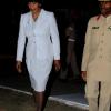 Winston Sill / Freelance Photographer
Brigadier Rocky Meade of The Jamaica Defence Force escorts Prime Minister Portia Simpson Miller to the army's annual Carol Service in the Open Air, held at Up Park Camp on Tuesday night December 11, 2012.