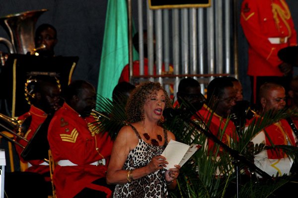 Winston Sill / Freelance Photographer
Guest performer Carole Reid brings her voice to the Jamaica Defence Force (JDF) annual Carol Service in the Open Air, held at Up Park Camp on Tuesday night December 11, 2012.