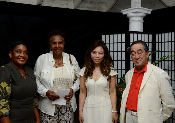 Winston Siill/Freelance Photographer
Japanese Ambassador Yasuo Takase and his wife Sayoko Takase host Send-Off Reception and Dinner for JET Representatives, held at Seaview Avenue, St. Andrew on Friday night June 27, 2014. Here are Claudia Barnes (left), former Ambassador of Jamaica to Japan; Marcia Thwaites (second left), wife of Minister Education Ronald Thwaites; Sayoko Takase (second right); and Ambassador Takase (right).