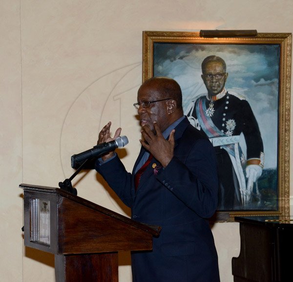 Winston Sill/Freelance Photographer
The Jamaica Institute of Management (JIM) Limited presents the JIM  2013 Manager of the Year Award Ceremony, held at King's House on Thursday evening May 29, 2014. Here is Dr. Henley Morgan, Chairman Emeritus, Agency for Inner-city Renewal, JIM Entrepreneurship and Community Development Award winner.