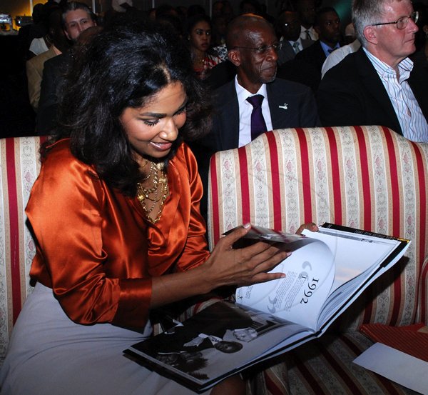Colin Hamilton/Freelance Photographer
Launch of the JIS Photo Album tho commemorate Jamaica 50th Anniversary at the Pegasus on July 18, 2012.
Youth & Culture Minister Lisa Hanna looks through the Jamaica 50 Album.