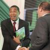 Ricardo Makyn/Staff Photographer
Prime Minister Andrew Holness shakes hands with Minister of Finance Audley Shaw during the Jamaica Labour Party's launch of its manifesto at The Jamaica Pegasus hotel in New Kingston yesterday.