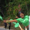 Ian Allen/Photographer
A JLP supporter waves her flag during a tour of Manchester earlier this week.