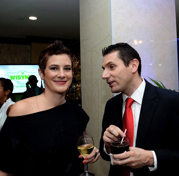 Winston Sill/Freelance Photographer
The Jamaica Manufacturers' Association Limited (JMA) in association with Digicel host the 46th Annual Awards Banquet, held at the Jamaica Pegasus Hotel, New Kingston on Thursday night October 9, 2014. Here are Debra Lopez-Spence (left), of Scotiabank; and Jason Corrigan (right), of Digicel.