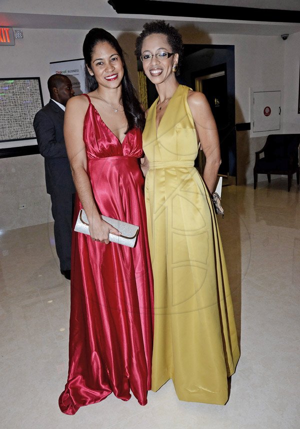 Winston Sill/Freelance Photographer
Catherine Goodall Regional Brand Manager Pepsi Cola Jamaica and Arlene L. Martin of Drenna Luna pose for the camera at The Jamaica Manufacturers' Association Limited (JMA) in association with Digicel host the 46th Annual Awards Banquet.