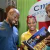Rudolph Brown/Photographer
Garth Walker, (left) and Simone Riley of Wealth Magazine team show thier magazine with Aswad Morgan, (right) director of marketing, Therapedic Caribbean at the JMA/JEA Expo at the National Arena