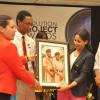 Jermaine Barnaby/Photographer
Earl Jarrett (right) General Manager of JNBS looks on as Saffrey Brown (left) General Manager Jamaica National Building Society Foundation and Mikhail Henry (second left) hands over one of his works to Minister of Youth and Culture Lisa hanna at the JN Foundation Resolution Project Awards Ceremony at the Olympia Gallery- 202 Old Hope Road on Tuesday, July 15, 2014.