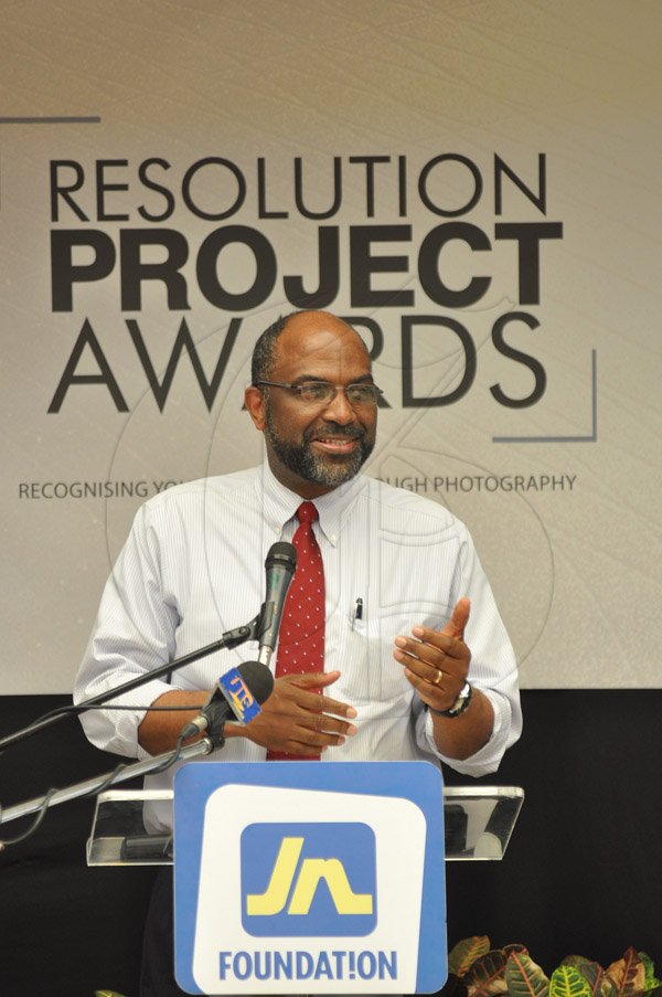 Jermaine Barnaby/Photographer
Earl Jarrett, General Manager of JNBS making an address at the JN Foundation Resolution Project Awards Ceremony at the Olympia Gallery- 202 Old Hope Road on Tuesday, July 15, 2014.