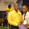 Jermaine Barnaby/Photographer
Carl Simpson collecting the best Selfy prize at the  JN Foundation Resolution Project Awards Ceremony at the Olympia Gallery- 202 Old Hope Road on Tuesday, July 15, 2014.