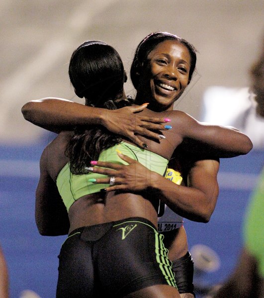 Ricardo Makyn/Staff Photographer
Jamaica's Shelly-Ann Fraser-Pryce (facing camera) embraces compatriot Veronica Campbell-Brown, following their one-two finish in the women's 200 metres, at the JN Jamaica International Invitationat, at the National Stadium on Saturday night.


 7.5.2011