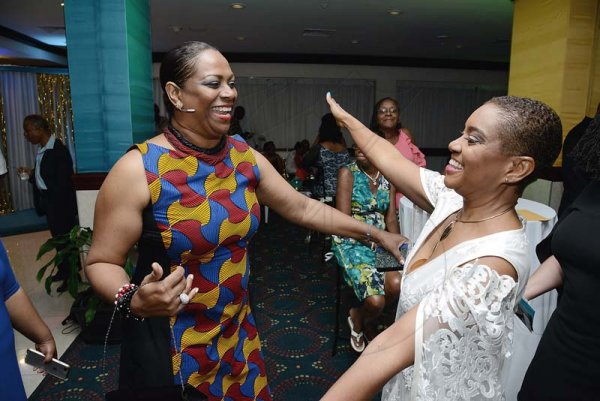 Rudolph Brown/ Photographer<\n>Patsy Latchman Atterbury (left), of Scotiabank, greets birthday girl Joan Forrest-Henry.<\n>at her 25/25 birthday celebration with families and friends at the Jamaica Pegasus Hotel in New Kingston on Saturday, June 30, 2018<\n>