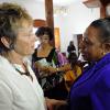 Rudolph Brown/Photographer
Dr Marjan DeBruin, (left) wife of the late John Maxwell greets by Minister Olivia Grange at the funeral sevice of John Maxwell at UWI Chapel on Monday, December 20-2010