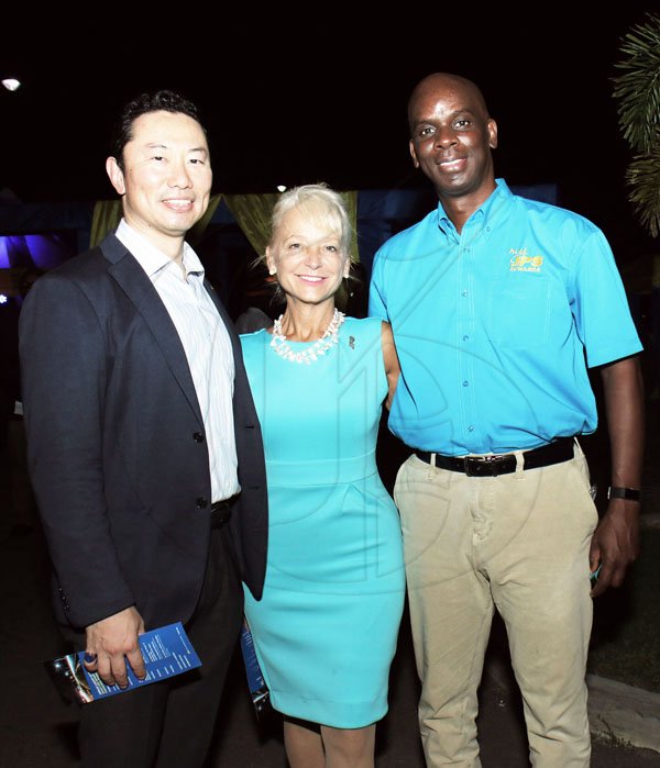*** Local Caption *** Starting from left- Seiji Kawamura (Chairman of the Board, JPS) poses with Kelly Tomblin (CEO and President, JPS) and Keith Garvey (VP Customer Service and Communications)