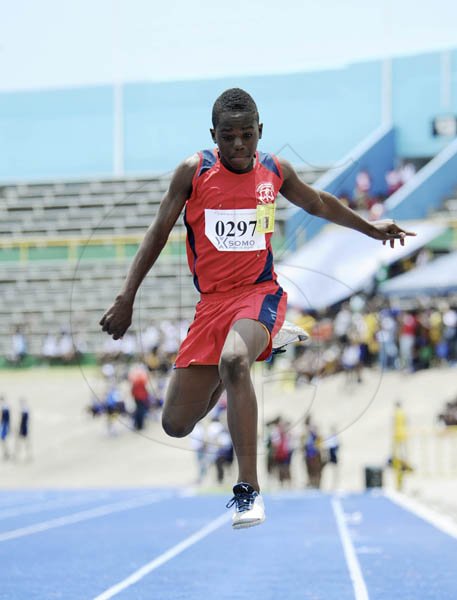 Ricardo Makyn/Staff Photographer
Jevaughn Taylor of Cockburn Pen winner of the Boys' Class 3 Long Jump with a leap of 5.72 Meter at the Junior High Schools track and field Championsips  2012 at the National Stadium day one at the National Stadium on Thursday 19.4.2012