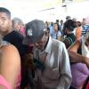 Rudolph Brown/Photographer
Passengers waiting to get there smart card at JUTC Transport Centrein Half Way Tree in Kingston on Wednesday, August 27, 2014