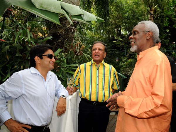 Winston Sill/Freelance Photographer
Kenny Benjamin host Brunch in honour of his OJ Award, held at Montgomery Road, Stony Hill on Monday October 21, 2013. Here are Vinay Walia (left); Dr. D---??? Tanna (centre); and former Prime Minister PJ Patterson (right).