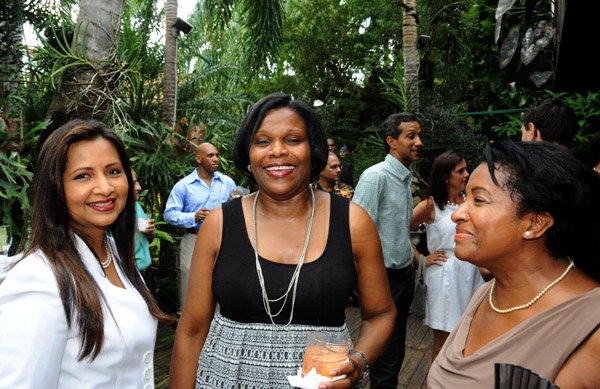Winston Sill/Freelance Photographer
Kenny Benjamin host Brunch in honour of his OJ Award, held at Montgomery Road, Stony Hill on Monday October 21, 2013. Here are Sheila Benjamin-McNeill (left); Jennifer Griffiths (centre); and Joan Gordon-Webley (right).