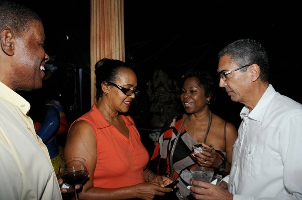 Winston Sill/Freelance Photographer
Guardsman Group Chairman Kenny Benjamin 60th Birthday  and  Appreciation Party with Family and a host of Friends,  held at Montgomery Road, Stony Hill on Saturday night July 13, 2013. Here are Steve Ashley (left);Betty Ashley (second left); Jascinth Byles (second right); and Richard Byles (right).
