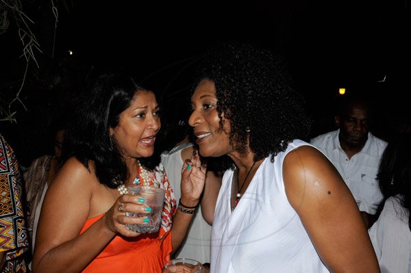 Winston Sill/Freelance Photographer
Guardsman Group Chairman Kenny Benjamin 60th Birthday  and  Appreciation Party with Family and a host of Friends,  held at Montgomery Road, Stony Hill on Saturday night July 13, 2013. HEre are Tamara Hill (left); and Dawn Henry (right).