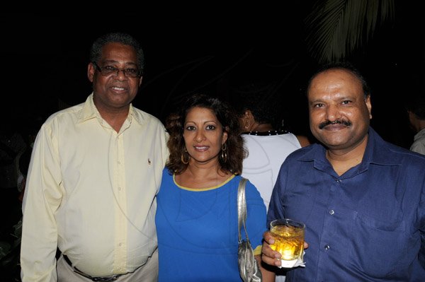 Winston Sill/Freelance Photographer
Guardsman Group Chairman Kenny Benjamin 60th Birthday  and  Appreciation Party with Family and a host of Friends,  held at Montgomery Road, Stony Hill on Saturday night July 13, 2013. Here Judge Glen Brown (left); Justice Ingrid Mangatal (centre); and Pratap Singh (right), Indian High Commissioner.