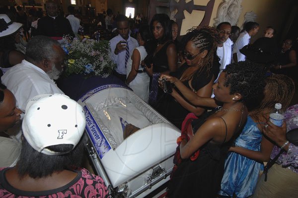 Ian Allen/Photographer
Wellwishers paying their last respect to Khajeel Mais at his funeral service at the Holy Trinity Cathedral on saturday.