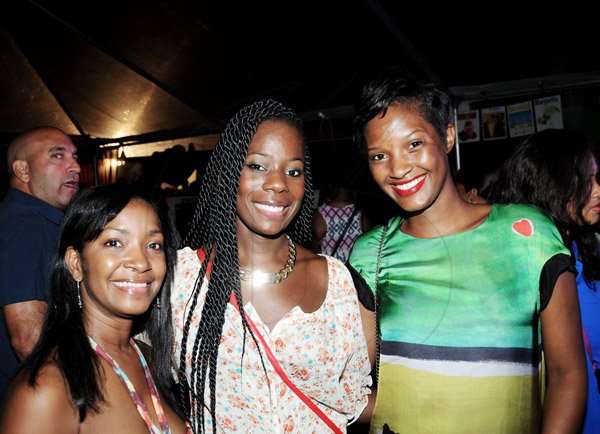 Winston Sill/Freelance Photographer
Tshani Jaja (left) Jacqui Burrell-Clarke (middle) and Ariane Collman
Kgn. Kitchen Night Market, held at Hope Gardens, Old Hope Road on Saturday night August 24, 2013.