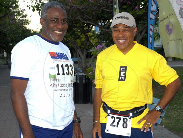 Colin Hamilton/Photographer                                                                                                                                                                                                         (L>R) Richard Gibbs and Chris Reckord.                                                                                                                                                                                  Kingston City 5K Run - March 10 - Emancipation Park