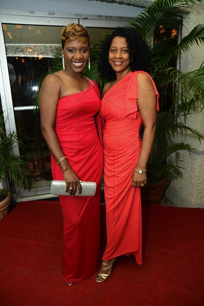 Rudolph Brown/Photographer
Immediate Past President Sharon Williams, (left) pose with  incoming President Lola Chin Sang at the Kiwanis Club of New Kingston Installation Banquet for the 2012 -2013, officers and Board of Directors at the Terra Nova Hotel in Kingston on Wednesday, October 10, 2012