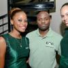 Rudolph Brown/Photographer
Rhyan James pose with Jessica Barrett, (left) and Shawna Campbell at the official of  open of Kris An Charles Investment Company Limited new office at the launch on 2 Eureka Crescent in Kingston on Thursday, September 5, 2013