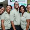 Rudolph Brown/Photographer
Luke Henry pose with from left Kavel Harris, Temerin Lawrence, Maxine Chevannes, Dania Binns and Opal Hutchinson at the  official open of Kris An Charles Investment Company Limited new office at the launch on 2 Eureka Crescent in Kingston on Thursday, September 5, 2013