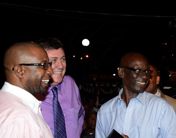 Winston Sill/Freelance Photographer
Kingston and St. Andrew Corporation (KSAC) Christmas Tree Lighting Ceremony and Concert, held at St. William Grant Park, Downtown, Kingston on Wednesday night December 3, 2014. Here are Andrew Swaby (left), Deputy Mayor, KSAC; Barry O'Brien (second left), CEO, Digicel; and Desmond McKenzie (right), Member of Parliament.