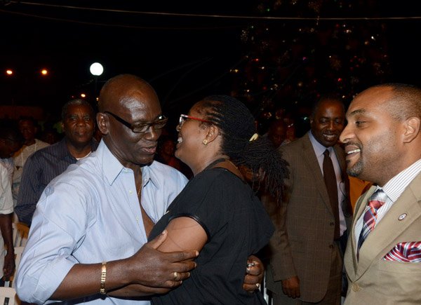 Winston Sill/Freelance Photographer
Kingston and St. Andrew Corporation (KSAC) Christmas Tree Lighting Ceremony and Concert, held at St. William Grant Park, Downtown, Kingston on Wednesday night December 3, 2014. Here are Desmond McKenzie (left), Member of Parliament; Mayor Angela Brown-Burke (centre); and Robert Hill (right), Town Clerk.