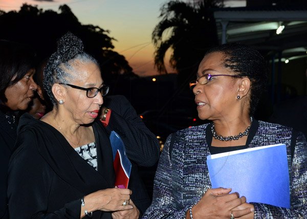 Winston Sill/Freelance Photographer
The Council of Legal Education, Norman Manley Law School Ceremony for The Presentation of Graduates, held at the Karl Hendrickson Auditorium, Jamaica College, Old Hope Road on Saturday night September 27, 2014. Here are Justice Hilary Phillips (left); and Jacqueline Samuels-Brown (right), Chairman, Council of Legal Education.