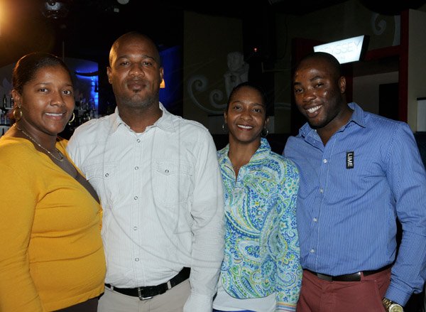 Winston Sill/Freelance Photographer
LIME Jamaica host reception to announce sponsorship of Comedy Shows, held at Fiction Lounge, Market Place, Constant Spring Road on Wednesday night May 22, 2013. Here are Nadine Rush (left); Robert Rush (second left); Natalie Rush (secondright); and Nathaniel Palmer (right).
