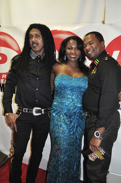 Contributed
Linkage Awards in New York
 Jamaican designer Flaco with Sandy Daley and Esroy Bernard who are both wearing Flaco's creations