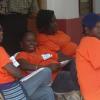 Photo by Adrian Frater

Nothing to do... PNP outdoor agents in Hanover looking very relaxed as they had very little worker to do in early hours yestersday.