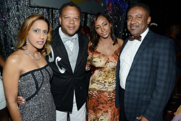 Rudolph Brown/Photographer
Phillip Paulwell and his wife to be (right) pose with Don Creary and his wife Ayesha Creary at the Luminous new year's Eve party at Hope Gardens on Tuesday, December 31, 2013