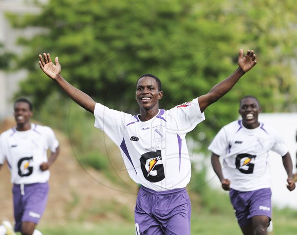 Ricardo Makyn/Staff Photographer
Kingston Colleges Shamala Ashman celebrates His goal against Meadowbrook High School in their encounter at Kingston College on Monday 10.9.2012