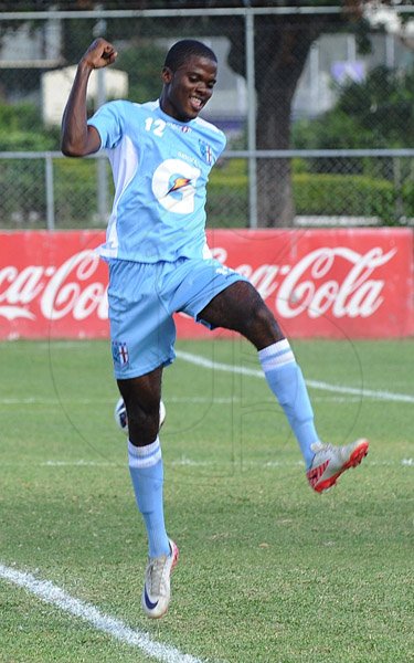 Ian Allen/Photographer
St George's College Mark Brown celebrates after scoring his team's second goal against Cumberland during their ISSA/Gatorade/Digicel Manning Cup match at Winchester Park yesterday. St George's won 7-1.