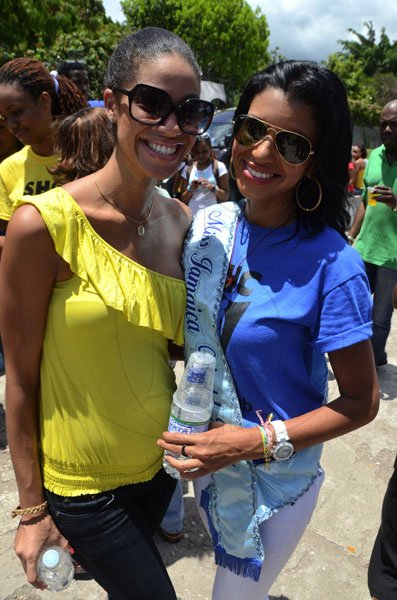 Rudolph Brown/Photographer
Former Miss Jamaica World,  Yendi Phillipps (left) and Miss Jamaica World 2011 Danielle Crosskill, (right) at the March and Rally for child's rights, awareness and protection in Jamaica from Bustamante Hospital to Emancipation Park on Tuesday, May 1-2012