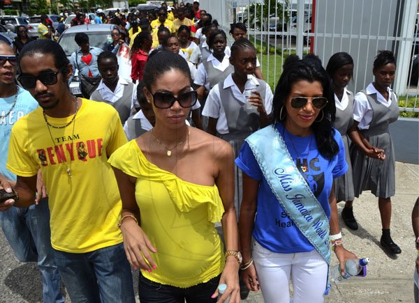 Rudolph Brown/Photographer
Former Miss Jamaica World,  Yendi Phillipps (centre) and Miss Jamaica World 2011 Danielle Crosskill, (right) March and Rally for child's rights, awareness and protection in Jamaica from Bustamante Hospital to Emancipation Park on Tuesday, May 1-2012
