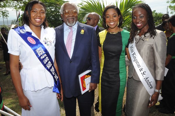 Rudolph Brown/Photographer
Julius Garvey, son of the Marcus Mosiah Garvey pose with the beauties from left Victoria Melhado, Nurse of the Year 2012/2013, Kystle Daley, Miss Jamaica Festival Queen 2011 and 2012 Miss Kingston and St Andrew Festival Queen Rasheen Roper at the Floral Tribute commemorating the 125th Anniversary of the birth The Rt. Excellent Marcus Mosiah Garvey, Jamaica National Hero at the National Heroes Park in Kingston on Friday, August 17-2012