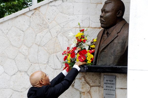Rudolph Brown/Photographer
Sir Patrick Allen Governor General of Jamaica lay flower at the Floral Tribute commemorating the 125th Anniversary of the birth The Rt. Excellent Marcus Mosiah Garvey, Jamaica National Hero at the National Heroes Park in Kingston on Friday, August 17-2012