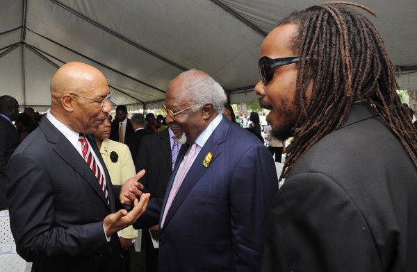 Rudolph Brown/Photographer
Sir Patrick Allen, (left) Governor General of Jamaica chat with Julius Garvey, (centre) son of the Marcus Mosiah Garvey and Steven Golding, President of UNIA Jamaica at the Floral Tribute commemorating the 125th Anniversary of the birth The Rt. Excellent Marcus Mosiah Garvey, Jamaica National Hero at the National Heroes Park in Kingston on Friday, August 17-2012
