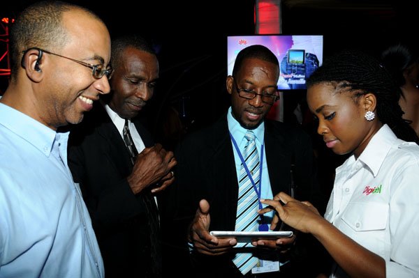 Winston Sill / Freelance Photographer
Digicel and Huawei presents the launch of the new Huawei Media Pad, held at Devon House, Hope Road on Monday night November 12, 2012. Here are Graham Dunkley (left); Wilburn Pottinger (second left); Courtney Bennett (second right); and Avadeen Davidson (right).
