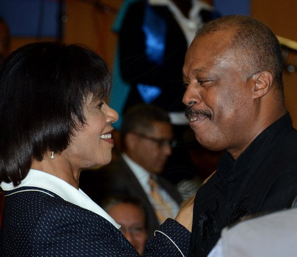 Winston Sill/Freelance Photographer
Prime Minister Portia Simpson-Miller opens UWI's   Faculty of  Medical Sciences' Teaching and Research Complex, and Launch of The UWI, Mona Dental Programme, held at West Road, UWI  Mona Campus, on Wednesday February 4 , 2015.  Here Prime Minister Portia Simpson-Miller (left) greets Prof. Sir Hilary Beckles (right), Principal, Cave Hill Campus.