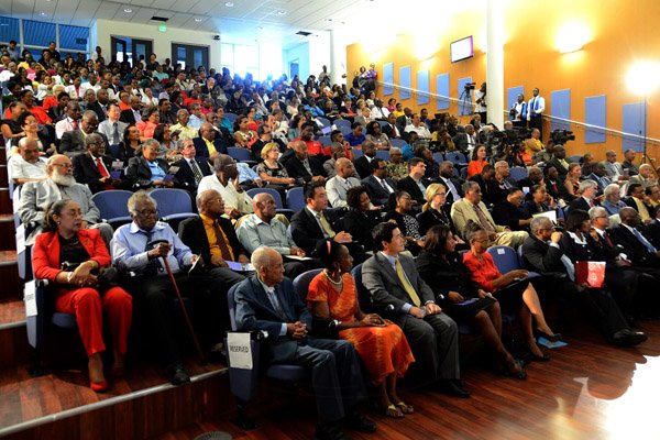 Winston Sill/Freelance Photographer
Prime Minister Portia Simpson-Miller opens UWI's   Faculty of  Medical Sciences' Teaching and Research Complex, and Launch of The UWI, Mona Dental Programme, held at West Road, UWI  Mona Campus, on Wednesday February 4 , 2015.  Here is a section of the crowd.